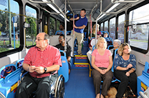 rider in wheelchair on bus